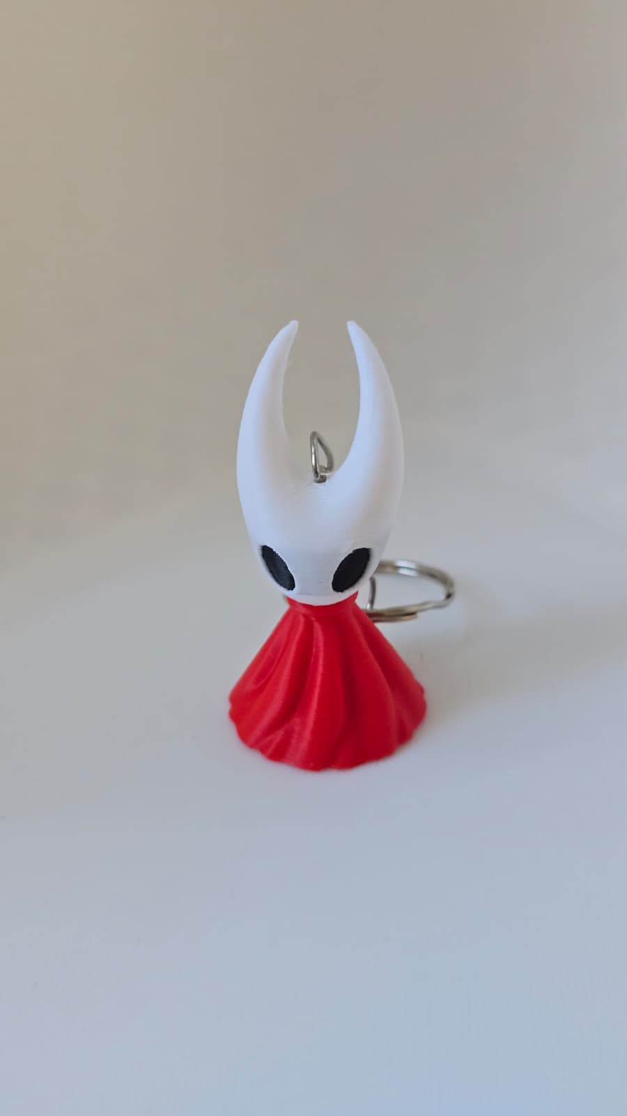 Llaveros Hollow Knight y Silksong en 3D