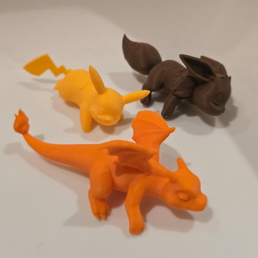 Decora tu monitor con este Pikachu, Eevee o Charizard dormidito