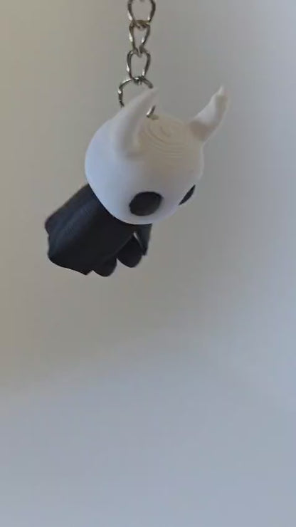 Llaveros Hollow Knight y Silksong en 3D